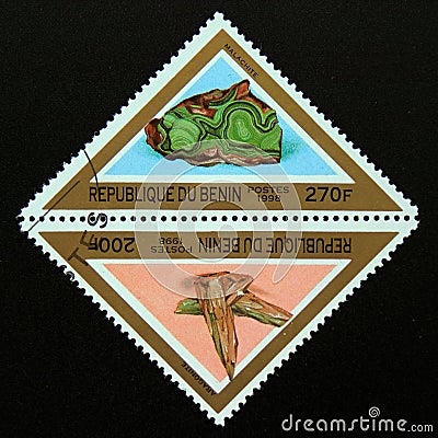 Triangle postage stamp Benin 1998. Aragonit, malachit mineral gemstone Editorial Stock Photo