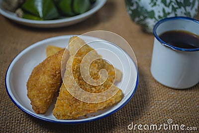 Triangle shape rissole with vegetable or sausage and mayonnaise filling Stock Photo