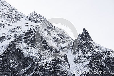 Triangle shaped snow cap mountain in the Polish Tatrah Stock Photo