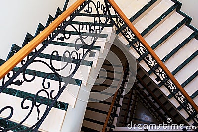 Triangle spiral shapes on the stairwell of a building. Architectural detail, abstract shapes Stock Photo