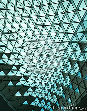 Triangles of Glass and Metal on an Airport Ceiling Stock Photo