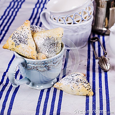 Triangular cookies with poppy seeds Stock Photo