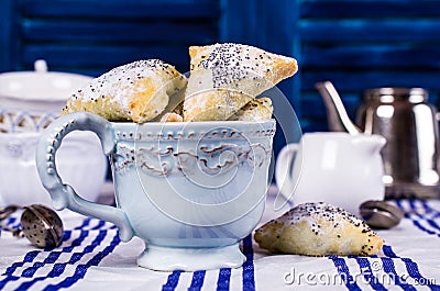 Triangular cookies with poppy seeds Stock Photo