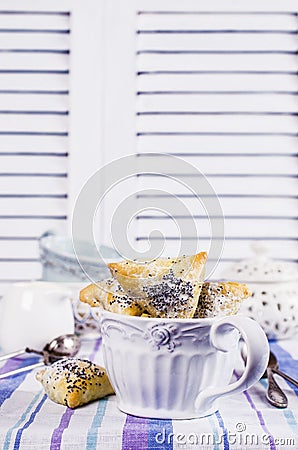 Triangular cookies with poppy seeds Stock Photo