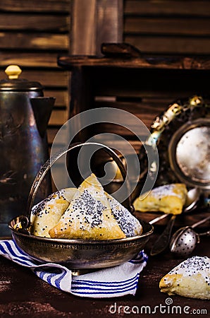 Triangular cookies with poppy seeds Stock Photo