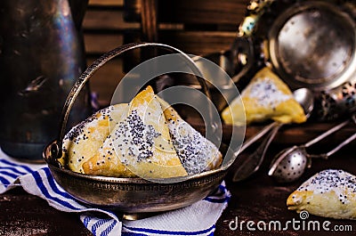 Triangular cookies with poppy seeds Stock Photo