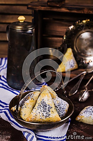 Triangular cookies with poppy seeds Stock Photo