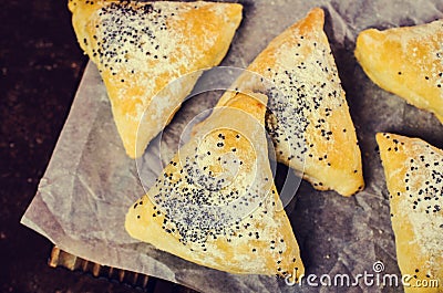 Triangular cookies with poppy seeds Stock Photo