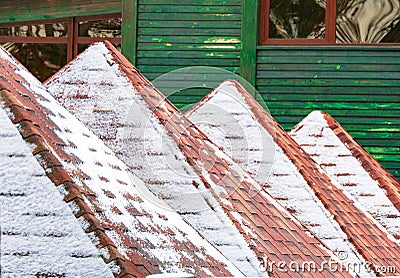 Triangular roofs of buildings in white snow Stock Photo