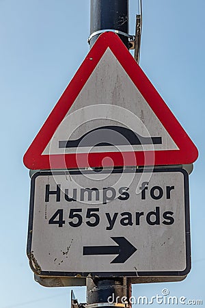 Triangular street sign warning of road humps Widnes April 2019 Stock Photo