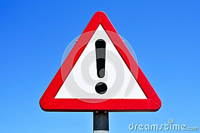 Triangular traffic sign with an exclamation mark Stock Photo