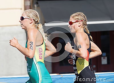 Triathlete Emma Jackson and Rebecca Robisch running Editorial Stock Photo