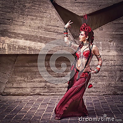 Tribal dancer moving and dancing outdoors Stock Photo