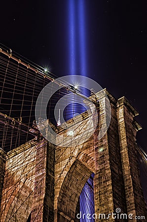The 911 Tribute in Light and the Brooklyn Bridge Editorial Stock Photo