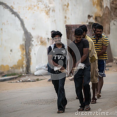 TRICHY, INDIA-FEBRUARY 14: Indian worker on February 14, 2013 in Editorial Stock Photo