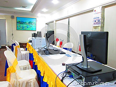 Tricolors table with computers. Editorial Stock Photo