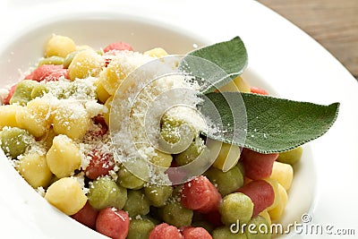 Tricolour gnocchi with sage Stock Photo