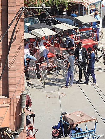 Tricycle drivers waiting for customers in Chandni Chowk, Old Delhi. Editorial Stock Photo