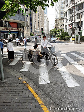 Tricycle on the street of Shanghai. Editorial Stock Photo