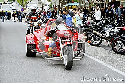 A tricycle to a gathering of American motorcycle Editorial Stock Photo