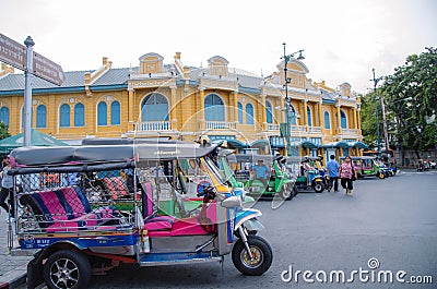 Tricycles and Tuk Tuks line up waiting to pick up tourists in front of the Golden Press store near the Grand Palace in Bangkok, Th Editorial Stock Photo