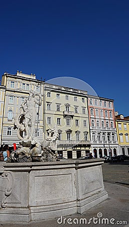 Trieste, Italy - October 1, 2023: Trieste, Italy - Neptune sculpture in the famous Piazza della Borsa Exchange Square Editorial Stock Photo