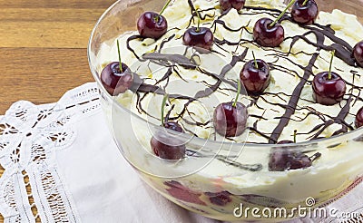 Trifel with black cherries, chocolate and cream Stock Photo