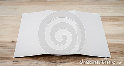 .Trifold white template paper on wood texture Stock Photo