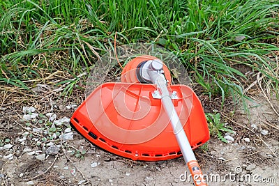 Trimer gascosis with leaf for mowing grass and shrubs Stock Photo