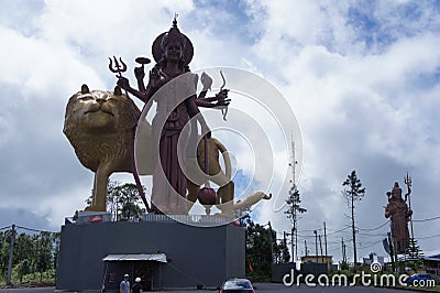 Trimurti-the unity of the gods Brahma, Vishnu and Shiva on the sacred lake on the island of Mauritius Editorial Stock Photo