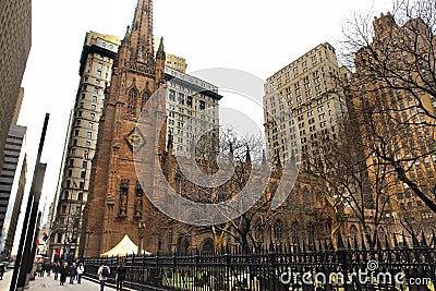 Trinity Church and Churchyard Cemetery during the winter, downtown, Manhattan, NY Editorial Stock Photo