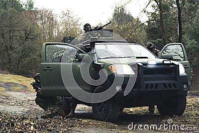 Trio outlaw soldiers being defensive at battlefield Stock Photo