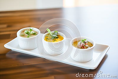 trio of small soup servings, spread for tasting variety Stock Photo