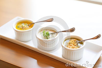 trio of small soup servings, spread for tasting variety Stock Photo