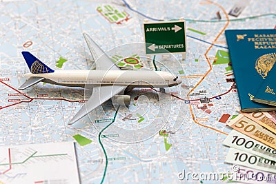 Trip to Italiyu- passport, plane and map of Milan Stock Photo