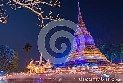 Triple Circumambulation around old pagoda of Trapangtong Temple in Sukothai Thailand Stock Photo