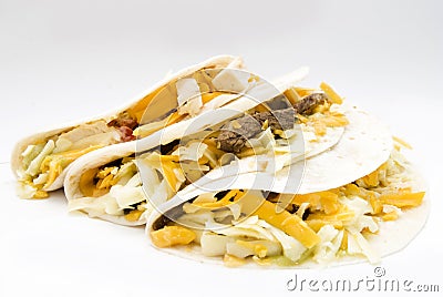 Triple taco chicken beef and pork Mexican food Stock Photo