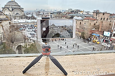 Tripod with smartphone holder as vlogging equipment. Stock Photo