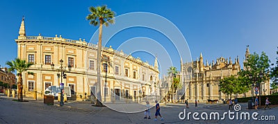 Triumph Square in front of the Royal Alcazar with a view of the Cathedral and Archivo de Indias. Panorama Editorial Stock Photo