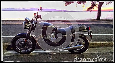Triumph Street Twin in Sunset Editorial Stock Photo