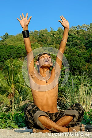 Triumphant Asian soldier Stock Photo