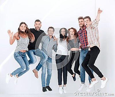 Triumphant group of young people Stock Photo