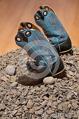 trival and traditional blue leather boots from mexico, on stones, mexico, Editorial Stock Photo