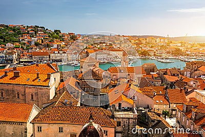 Trogir in Croatia, town panoramic view with red roof tiles, Croatian tourist destination. Trogir town sea front view, Croatia. Stock Photo