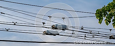 Trolleybus power wires switch box splitter used to change direction Stock Photo