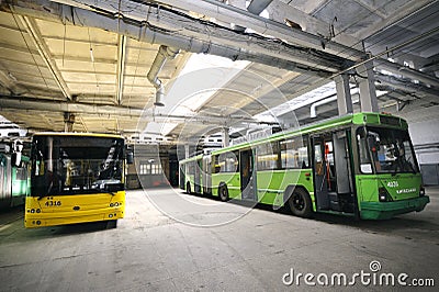 Trolleybuses parked at a trolley depot hangar for technical inspection, depot maintenance Editorial Stock Photo