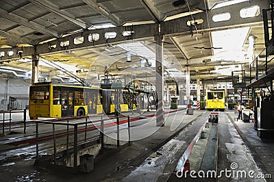 Trolleybuses parked at the trolley depot hangar for technical inspection, depot maintenance Editorial Stock Photo