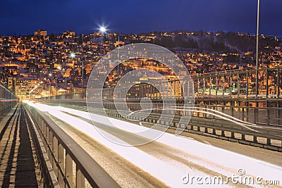 Tromso Bridge to City at dusk Stock Photo