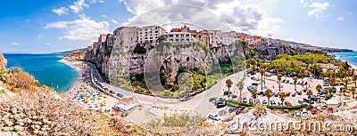 Tropea cityscape panorama with high cliffs with built on top city buildings and apartments, Rotonda beach full of people, streets Editorial Stock Photo