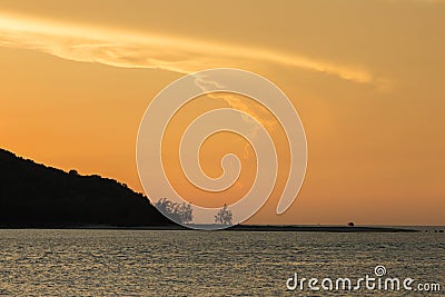 Tropic island sunset scene Stock Photo